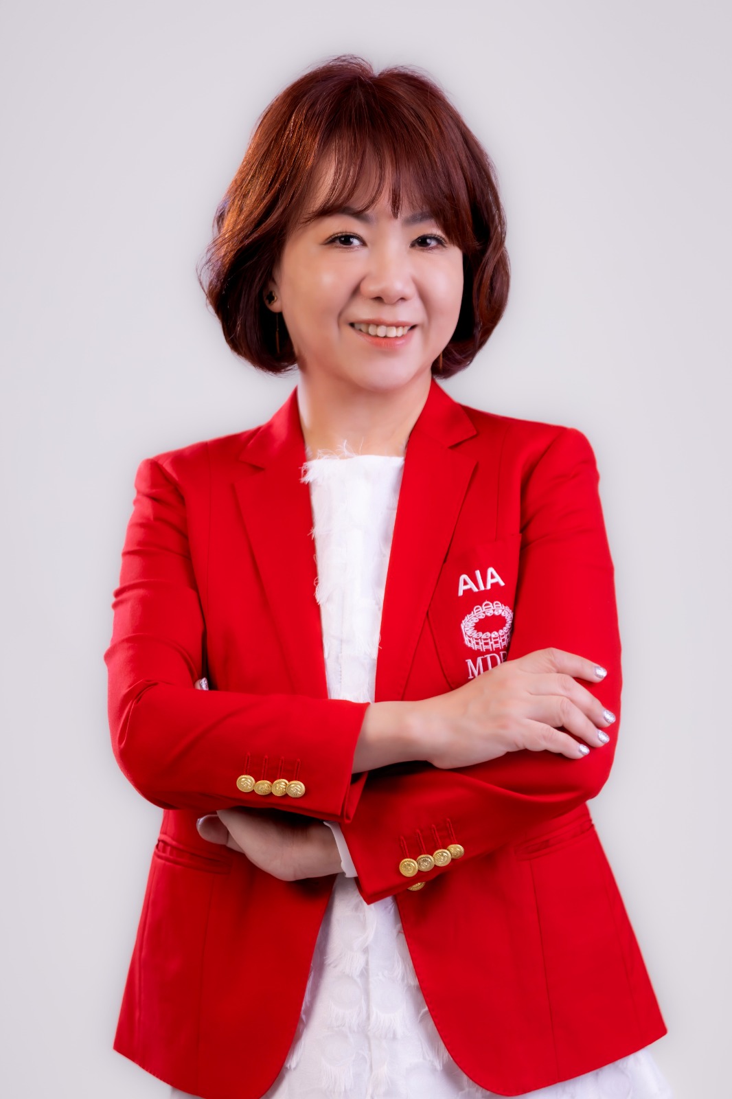 Miss Annie Ho — AIA MDRT financial professional and millionaire success story